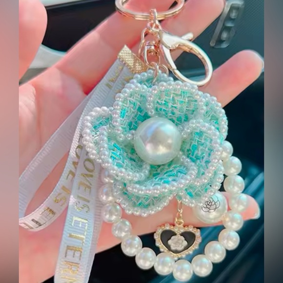Accessories - NWOT choose one light blue or pink pearl fashion bag charm and or keychain